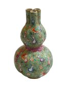 Chinese triple form vase having polychrome and gilt decorated on blue/green ground, gilt seal mark,