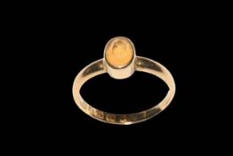 18 carat gold gem set ring, size M.
