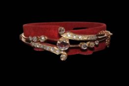 Impressive diamond hinged bangle set in unmarked yellow gold,