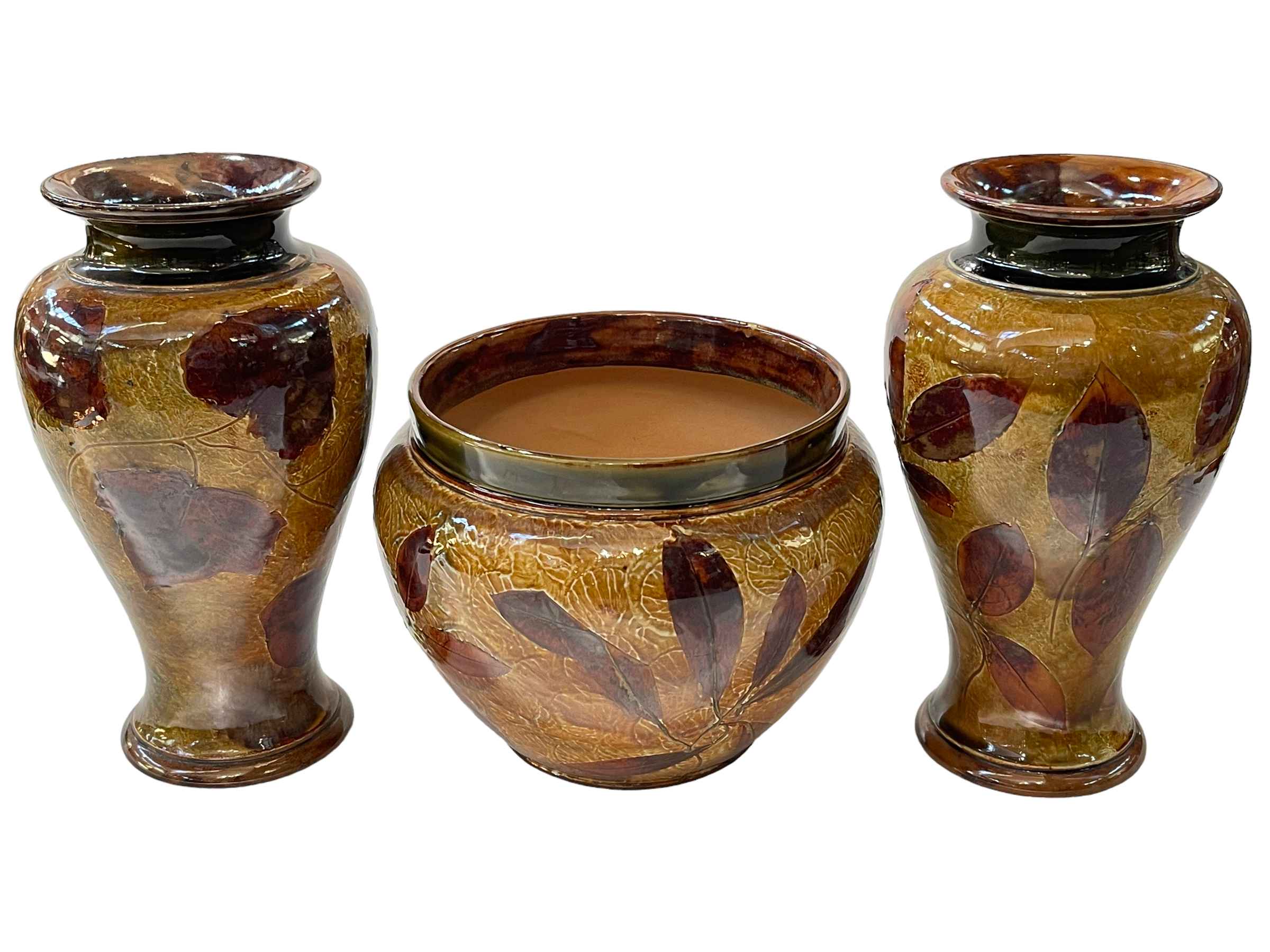 Three pieces of Royal Doulton Autumn Leaf stoneware vases, 26.5cm.