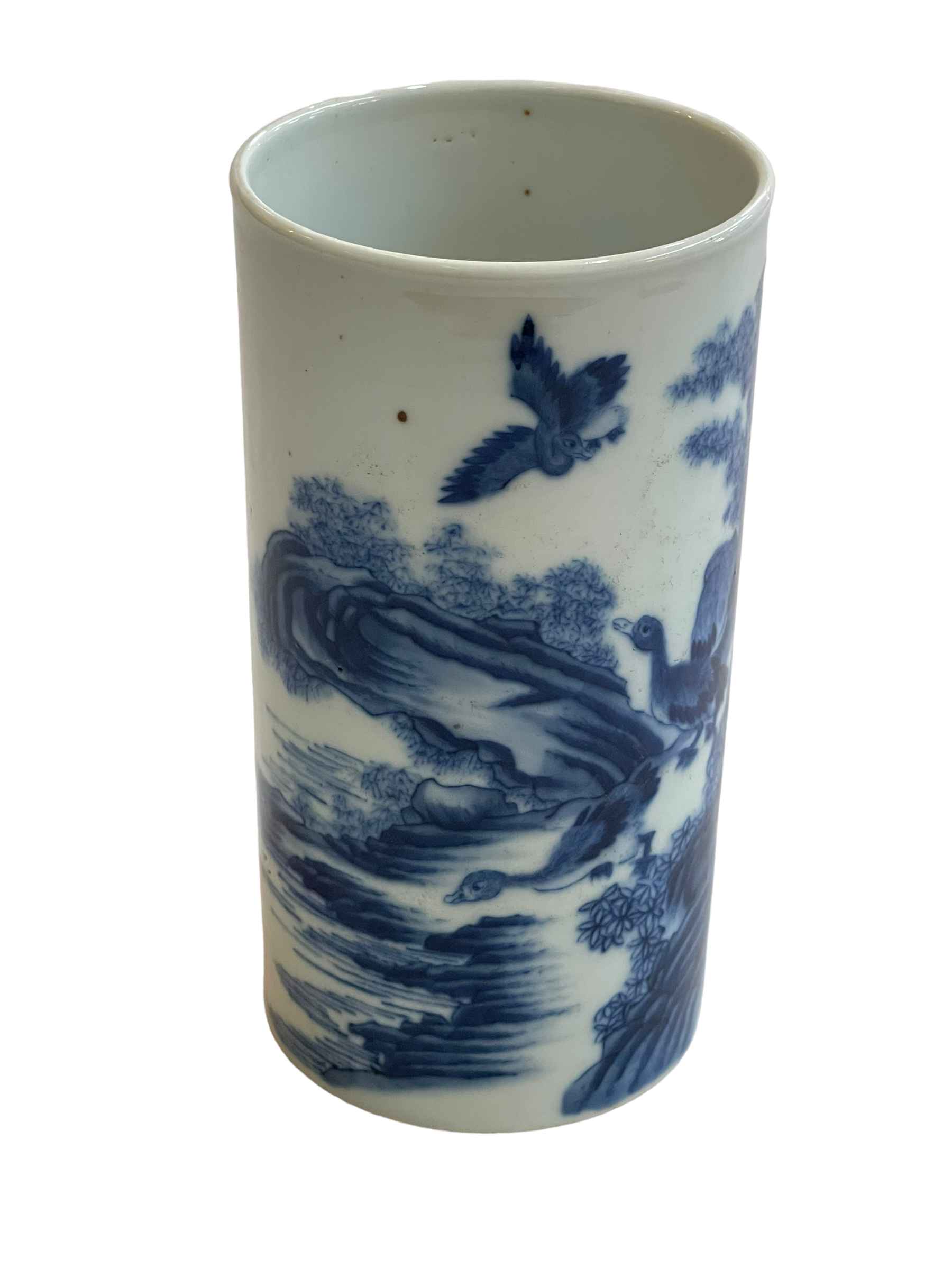 Chinese blue and white brush pot with birds in mountainous landscape, six character mark, 17cm.