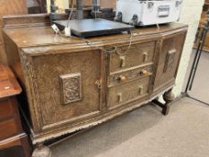 1920's carved oak sideboard, 106cm by 139cm by 56cm.