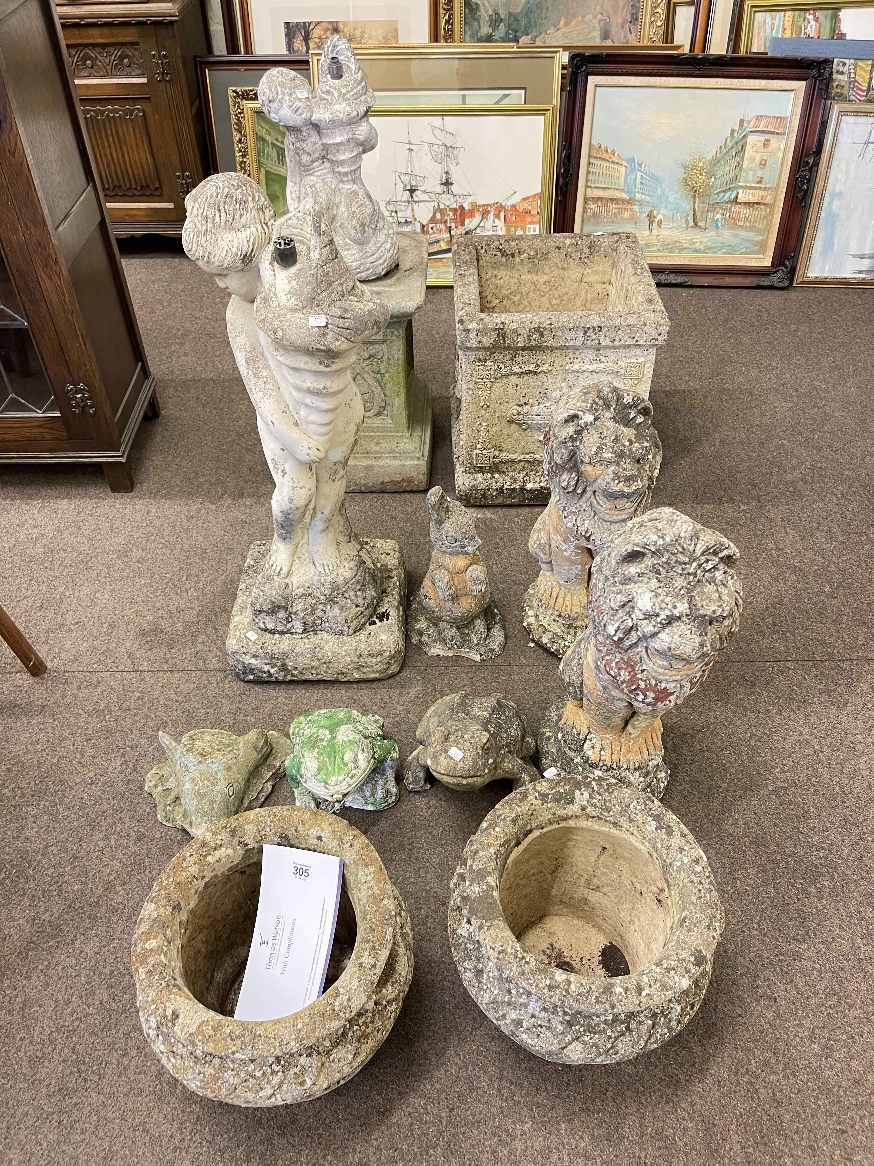 Collection of garden planters and figures including pair urns, pair lions, plinth, etc.