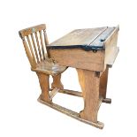 Vintage child's combination school desk-chair.