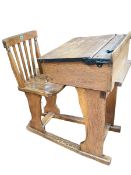 Vintage child's combination school desk-chair.