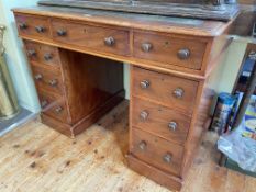Victorian mahogany nine drawer pedestal desk, 74cm by 99cm by 61cm.