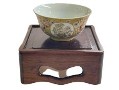 Chinese famille rose on yellow ground bowl, 13cm diameter, with stand.