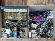 Two boxes of costume jewellery.