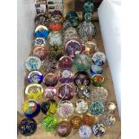 Collection of glass paperweights.