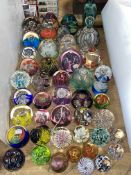 Collection of glass paperweights.