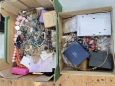 Two boxes of costume jewellery.