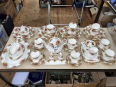 Over sixty pieces of Royal Albert Old Country Roses tea and dinnerware.