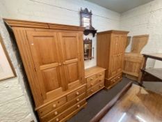 Pine four piece bedroom suite comprising two double door combination wardrobes,