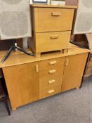 Contemporary beech finish two door sideboard and two drawer pedestal chest.