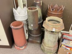 Collection of five various chimney pots including one double topped and two crown topped.