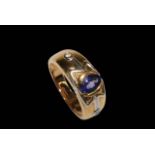 Tanzanite and diamond 18 carat gold ring, size N.