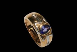 Tanzanite and diamond 18 carat gold ring, size N.