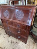 Oriental rosewood four drawer bureau, 106cm by 91cm by 47cm.
