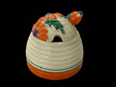 Clarice Cliff Beehive honey pot with flower finial, 7cm.