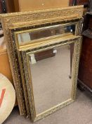 Four various gilt framed wall mirrors, largest 110cm by 80cm.