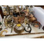 Beaten copper coal scuttle, ships clock, brass coloured table lamps, irons, etc.