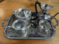 Five piece silver plated tea service with embossed and engraved decoration.