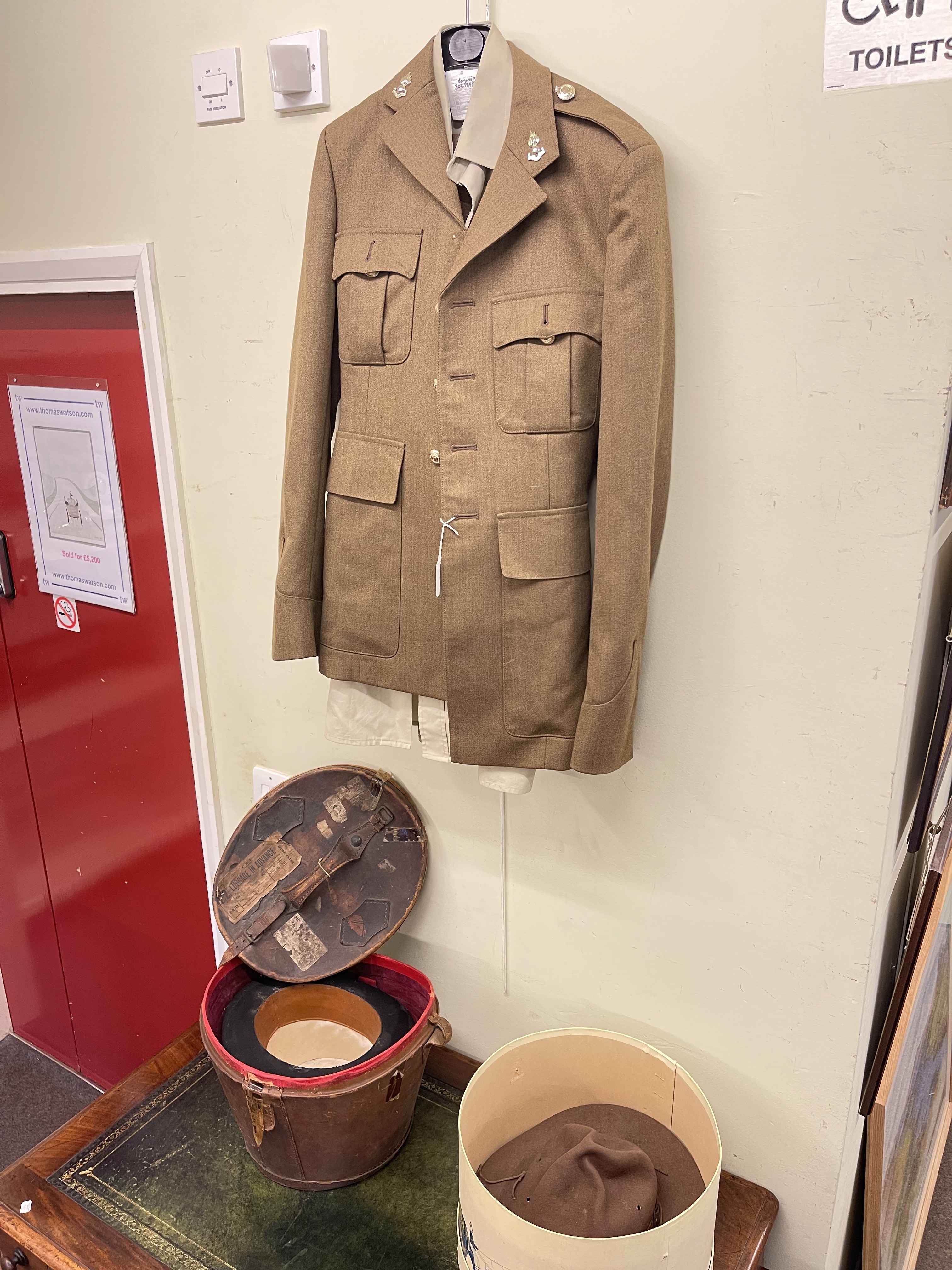 Military jacket, top hat in leather hat box, sheepskin pilots hat, etc.