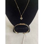 9 carat gold bangle with garnet and 9 carat gold pendant and chain (2).
