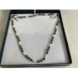 Bead necklace with pearl, green stone and probably gold beads, 44cm.