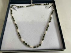 Bead necklace with pearl, green stone and probably gold beads, 44cm.