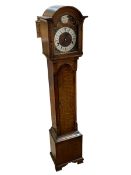 Oak grandmother clock with Westminster chime, 137cm.