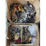 Two boxes of costume jewellery, wristwatches, coins, etc.
