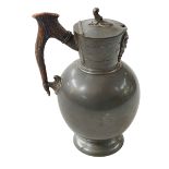 Victorian Britannia metal wine jug with antler handle.