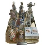 Three Lladro and seven Nao figures and four Royal Albert Beatrix Potter characters and Ladybird