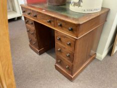 Victorian mahogany nine drawer pedestal desk, 74cm by 99cm by 61cm.