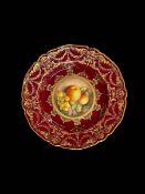 Royal Worcester fruit painted plate with gilt border, signature indistinct, 22.5cm diameter.