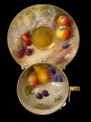 Royal Worcester fruit painted cup and saucer, signed Rickets and Shuck.