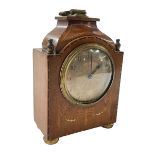 Inlaid mahogany mantel clock with brass handle, finials and feet, 22cm high.