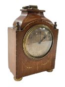 Inlaid mahogany mantel clock with brass handle, finials and feet, 22cm high.