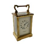 Gilt brass carriage clock, the face signed Garrard & Co Ltd, Regents Street.