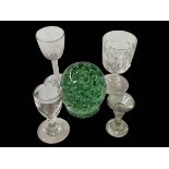 Antique cotton twist stem glass, three other glasses and green dump (3).