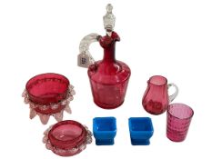 Collection of five pieces of cranberry glass and pair of blue glass salts.