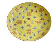 Chinese yellow glaze plate decorated with butterflies with Tongzhi four character mark to base,
