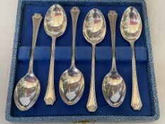 Set of six silver teaspoons with bead borders, Birmingham 1935.