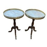 Pair circular marble topped tripod wine tables, 58.5cm by 39cm diameter.