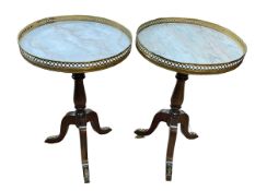 Pair circular marble topped tripod wine tables, 58.5cm by 39cm diameter.