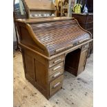 Indianapolis Cabinet Co, early 20th Century roll top desk, 114cm by 121cm by 76cm.