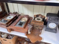 Two slate mantel clocks, two Gingerbread clocks and wall clock.