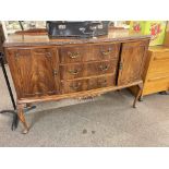Mahogany bow front sideboard on cabriole legs, 99cm by 139cm by 53cm.