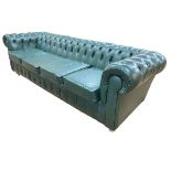 Bottle green deep buttoned leather four seater Chesterfield settee, 264cm.